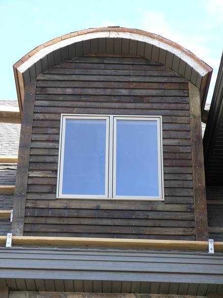 Dormer Clad with Picklewood / This dormer is clad with Weathered Picklewood Wedge-Lap siding